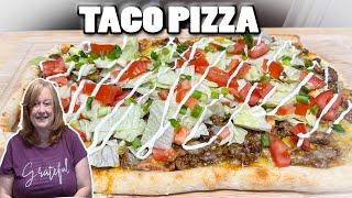 TACO PIZZA, A Pizza full of Taco Flavorings & Toppings