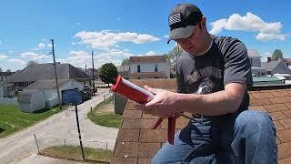 How to seal down a wind damaged roof shingle.