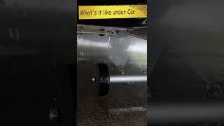 How efficient is water broom cleaning the underside of a car
