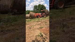 Let’s see how quick we can move this hay! #farmlife #farm #kubota #kubotatractor #tractor #hay