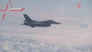 Exclusive footage: Su-27 fighter drives NATO F-16 away from Shoigu aircraft