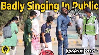 Badly Singing In Public