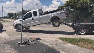 Man Tries to Drive Away in Truck as It’s Being Towed