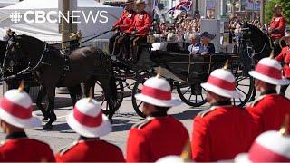 King Charles and Queen Camilla parade to Parliament