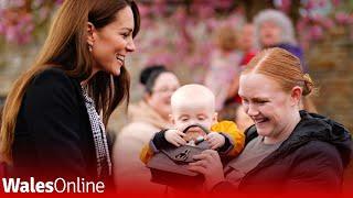 Adorable moment baby grabs Kate Middletons bag during Royal Visit and won't give it back