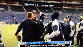 Jimmy Graham and Seattle D 'chat' before the game.