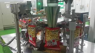 AUTOMATIC MULTI HEAD WEIGHER+ROTARY PACKING M/C FOR Puffed Rice