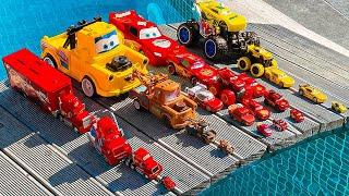 Disney Pixar Cars falling into deep pool, Lightning McQueen, Tow Mater, Mack, Sally, Francesco