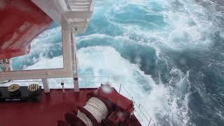 Cargo ship in storm at Kuril islands, North Pacific