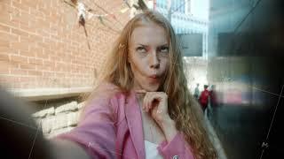 Portrait of cute young blonde taking selfie posing with funny faces looking at camera outdoors