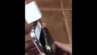 Guy charging 3 phones meme