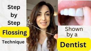 Step by Step Flossing Technique Shown by a Dentist