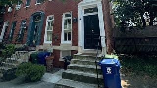 Touring a two bedroom two bath with private outdoor space in Baltimore city