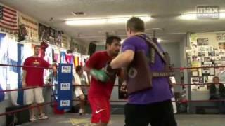 Manny Pacquiao on the mitts with Freddie Roach