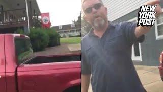 'This is Nazi America': Woman confronts man flying swastika flag | New York Post