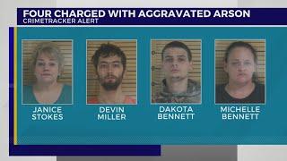 Four charged with aggravated arson