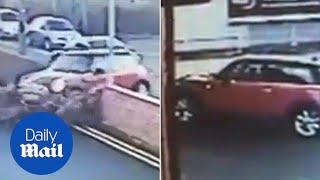 Bizarre collision as Mini driver U-turns through brick wall - Daily Mail