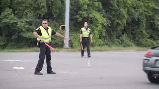 Detective dances while directing traffic after major storm