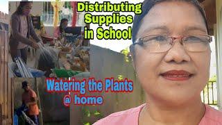 Watering the plants at Home + Distributing supplies in School by Team Briana