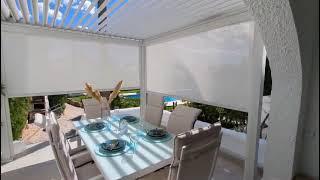 Dreamgarden - Pergola Tropea mit Seitenmarkisen - Montagebeispiel