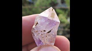 Terminated Amethyst crystal with Hematite inclusions mineral specimen from Teshovo in Bulgaria.