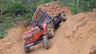 KuBoTa tractors transport wood on winding, dangerous roads