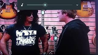 Slash/Saul Hudson annoyed at store owner and walks out