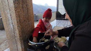 Delicious local curd and eggplant. Delicious nomadic evening. Cooking in the nature of the village .