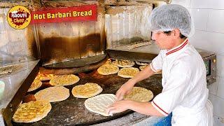 Process of baking Barbari bread with a young baker