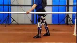 SCI patient wearing active orthoses