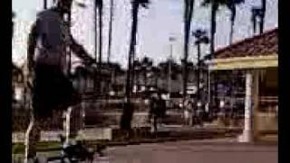 Bike stunt Surfing on Beach Cruizer  on beach boardwalk