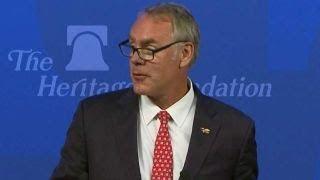 Interior Secretary Ryan Zinke defends private flights