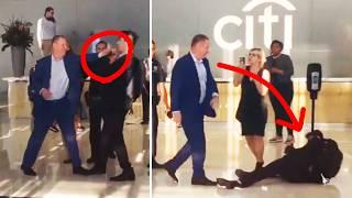 EXPLOSIVE 15 Seconds: Wall Street Banker SLAPS Activist After Camera Confrontation