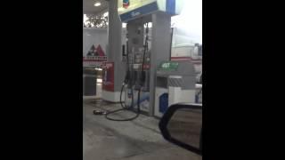 Lady rips off gas pump