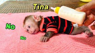 Mom tried to take care of Tina when Tina was tired and didn't want to drink milk.