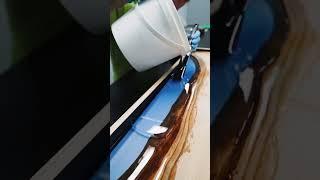 Pouring Dalchem Crystal Clear Resin to create this stunning Coffee Table! #rivertable #epoxy #resin