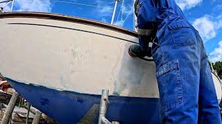 Removing years of failed paint from a 60 year old boat hull