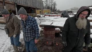 sawing frozen cherry logs on a freezing day # 654