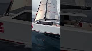 a sleek electric catamaran with solar-wing sails