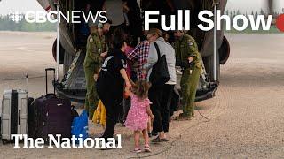 CBC News: The National | Thousands flee wildfires in Western Canada