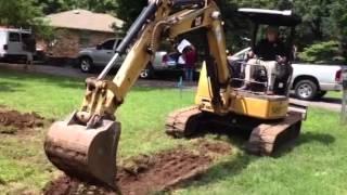 John G. Brittle, Jr. Working The Backhoe