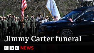 Jimmy Carter's US state funeral begins in Georgia | BBC News