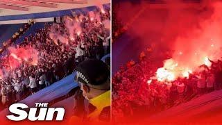 Legia Warsaw ATTACK police, storm Leicester stands & set off flares at Europa League match