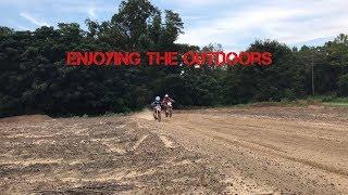 Dirt bike riding on a dirt track