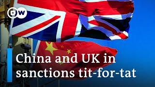 China responds to UK sanctions over Xinjiang with sanctions | DW News