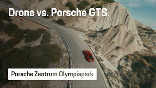 Drone vs. Porsche GTS.