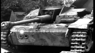 Wrecked German tanks on the road in France. HD Stock Footage