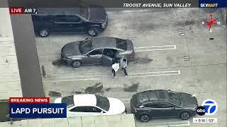 Police are chasing suspects through Studio City