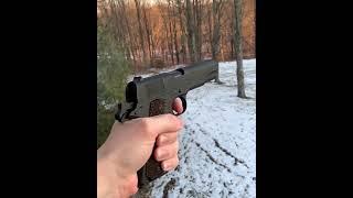 Shooting a colt 1911 slow motion