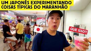 Um japonês experimentando coisas típicas do Maranhão